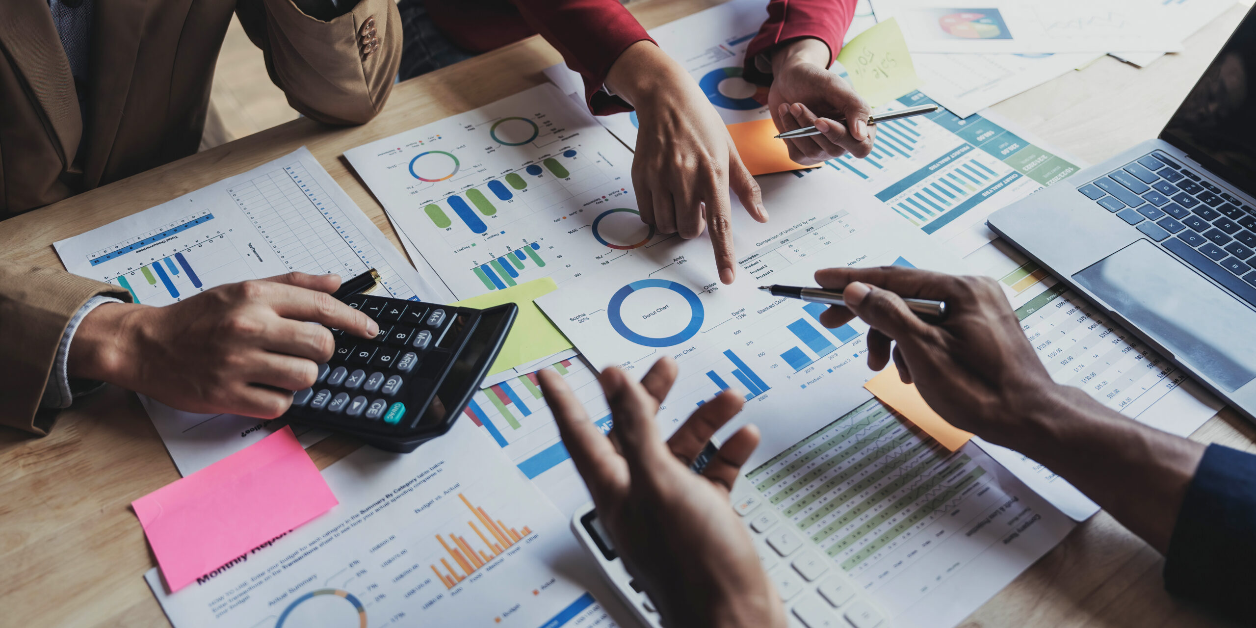 business financial, accountant discussing with partner are meeting to audit finance planning sales to meet targets set in next year. stock market concept..